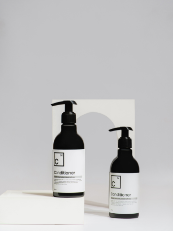 Creamy texture of Dr. Elements Hair Conditioner showing its smooth, hydrating formula for soft and manageable hair.